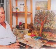 Leopoldo Varela ante unha das súas obras